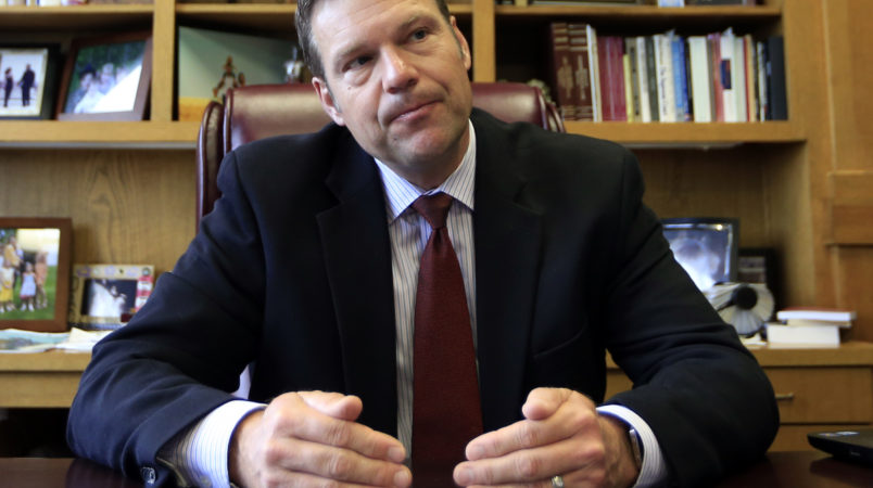 Secretary of State Kris Kobach talks with a reporter in his office in Topeka, Kan., Wednesday, May 17, 2017. (AP Photo/Orlin Wagner)