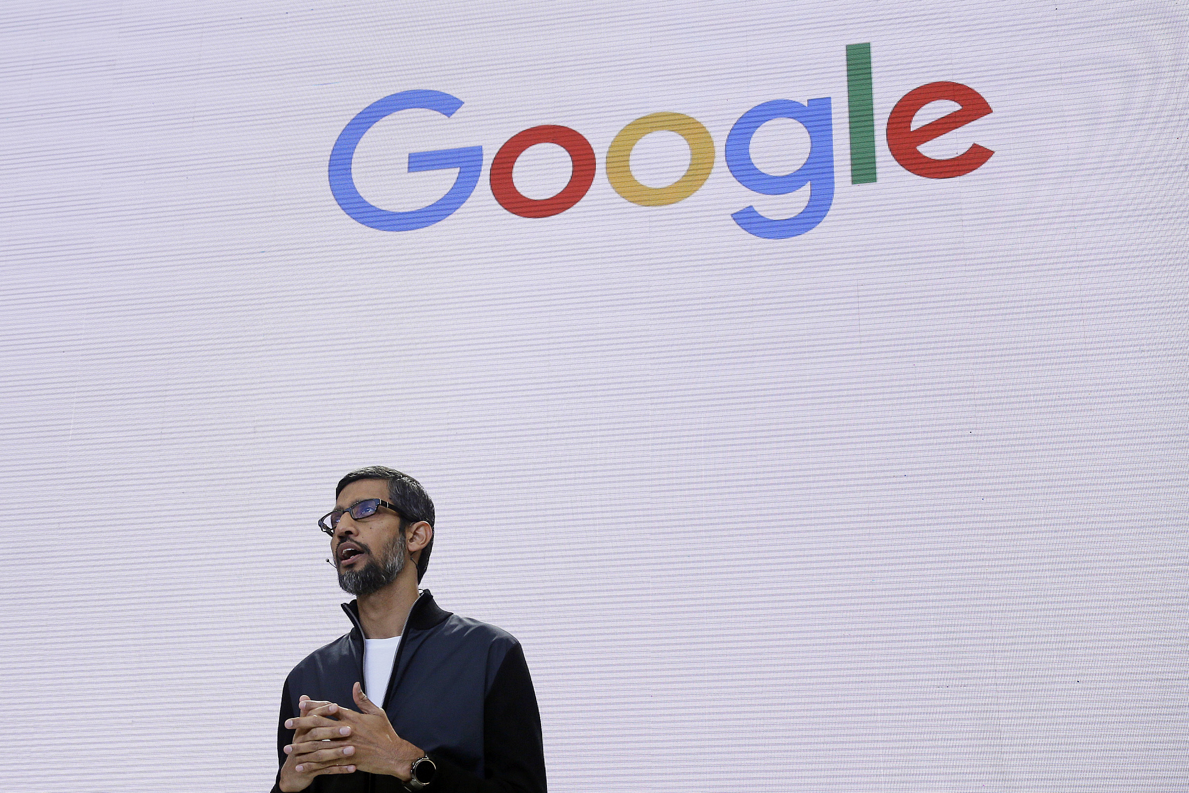 FILE - In this file photo dated Wednesday, May 17, 2017, Google CEO Sundar Pichai delivers the keynote address for the Google I/O conference in Mountain View, Calif. USA. The Paris administrative court on Wednesday July 12, 2017, in French has annulled a 1.11 billion-euro (US dlrs 1.27 billion) tax adjustment imposed on the Californian firm by France's tax authorities. (AP Photo/Eric Risberg, FILE)