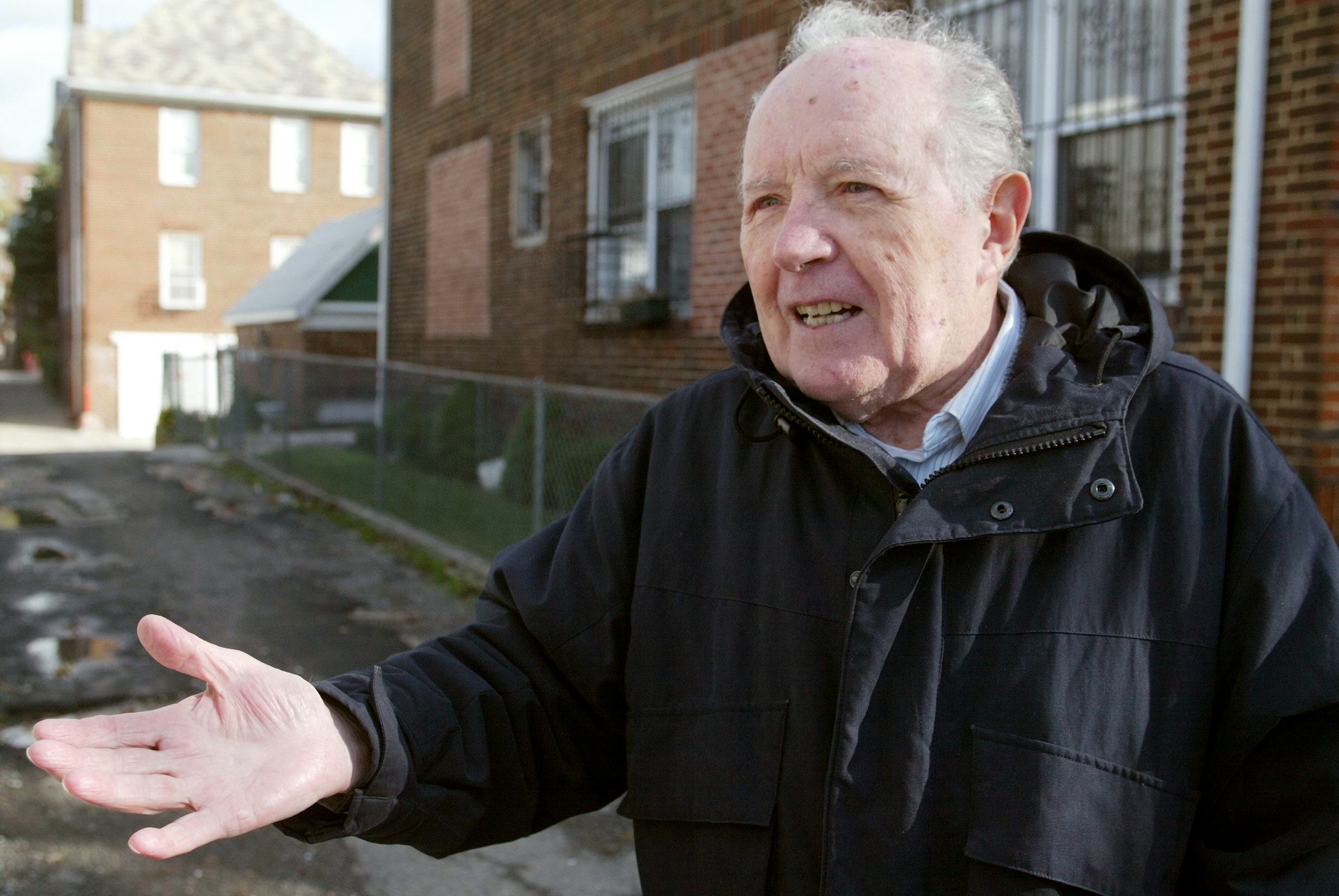 FILE - In this Nov. 20, 2003 file photo photo, Jakiw Palij stands out in front of a building in the Queens borough of New York. Palij is among at least 10 suspected Nazi war criminals ordered deported by the United States who never left the country, according to an Associated Press review of Justice Department data. (Suzanne DeChillo/The New York Times via AP, File) - NO SALES - INTERNET OUT