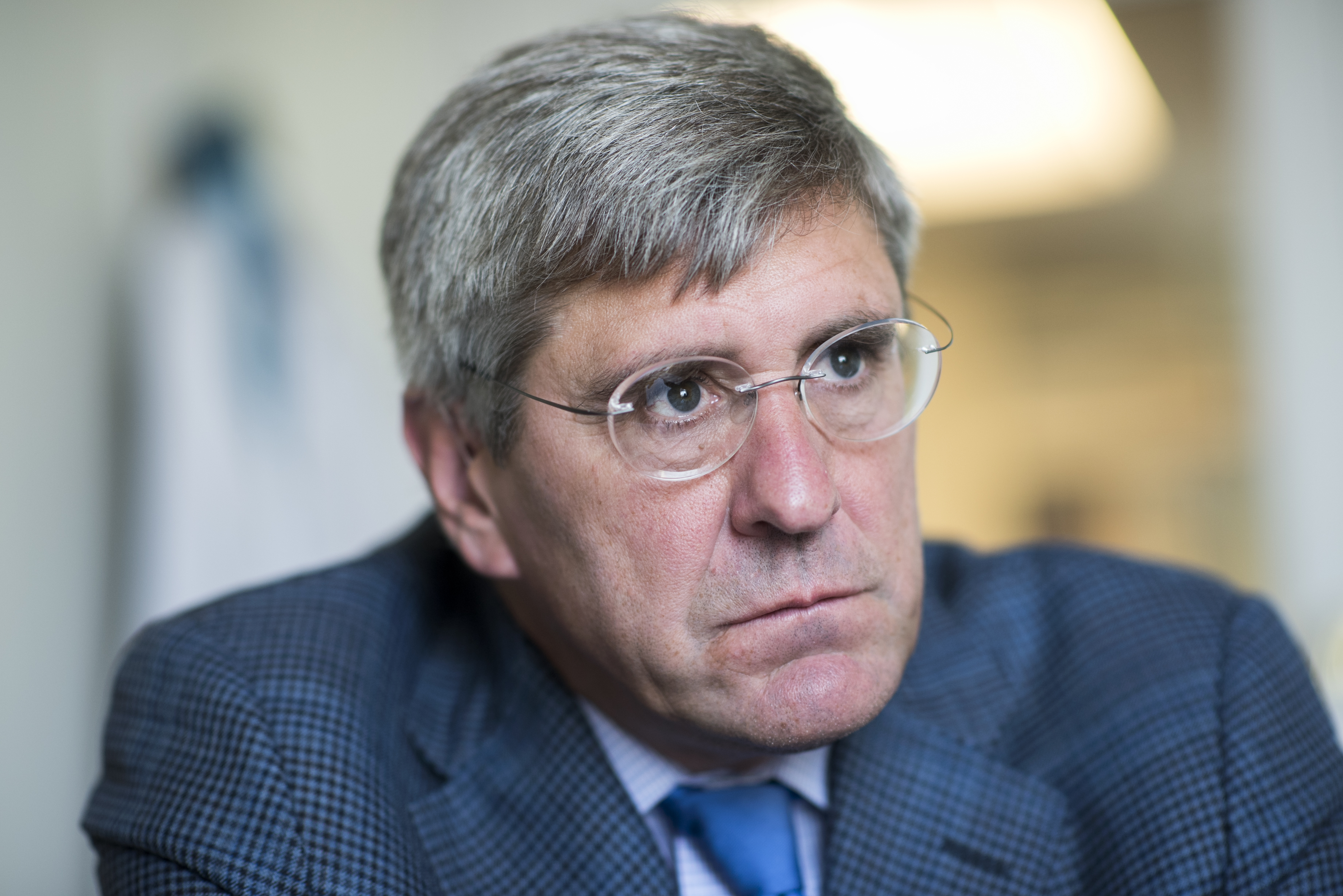 UNITED STATES - AUGUST 31: Stephen Moore of The Heritage Foundation is interviewed by CQ in his Washington office, August 31, 2016. (Photo By Tom Williams/CQ Roll Call)