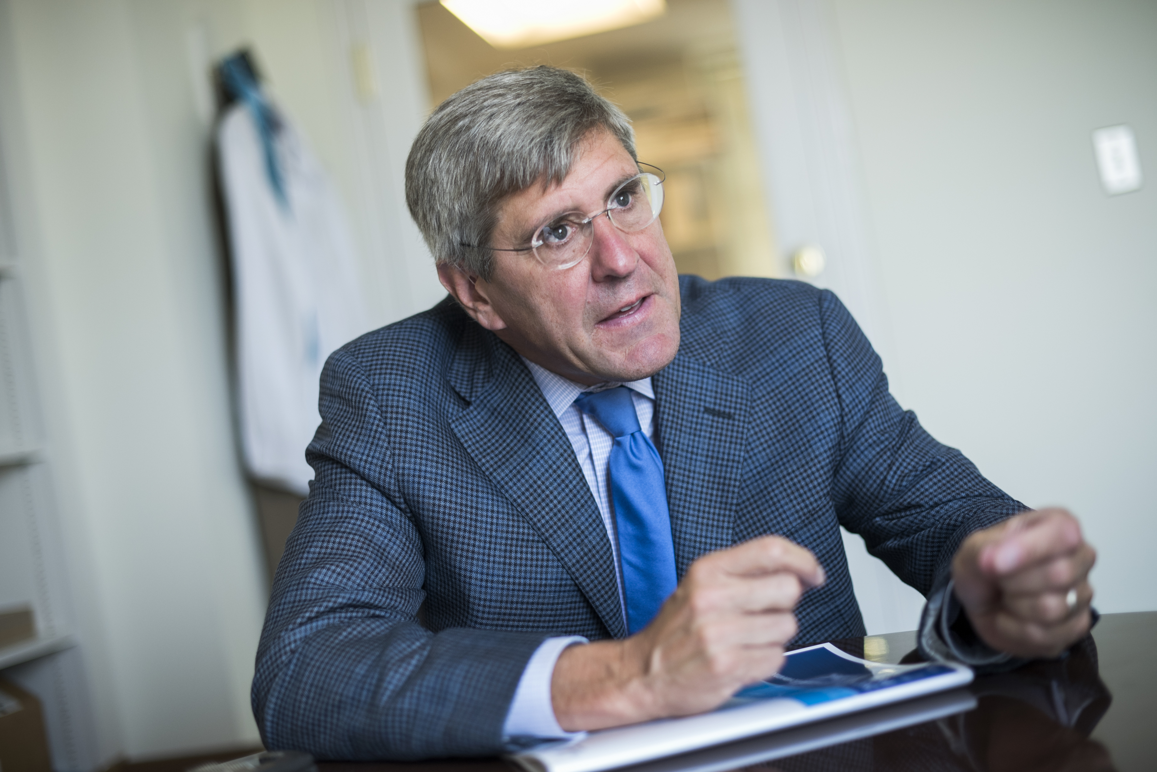 UNITED STATES - AUGUST 31: Stephen Moore of The Heritage Foundation is interviewed by CQ in his Washington office, August 31, 2016. (Photo By Tom Williams/CQ Roll Call)