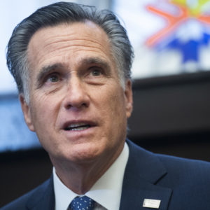 UNITED STATES - DECEMBER 17: Sen. Mitt Romney, R-Utah, conducts a news conference in Russell Building on student athlete compensation on Tuesday, December 17, 2019. NCAA president Mark Emmert and Sen. Chris Murphy, D-Conn., also attended. (Photo By Tom Williams/CQ Roll Call)