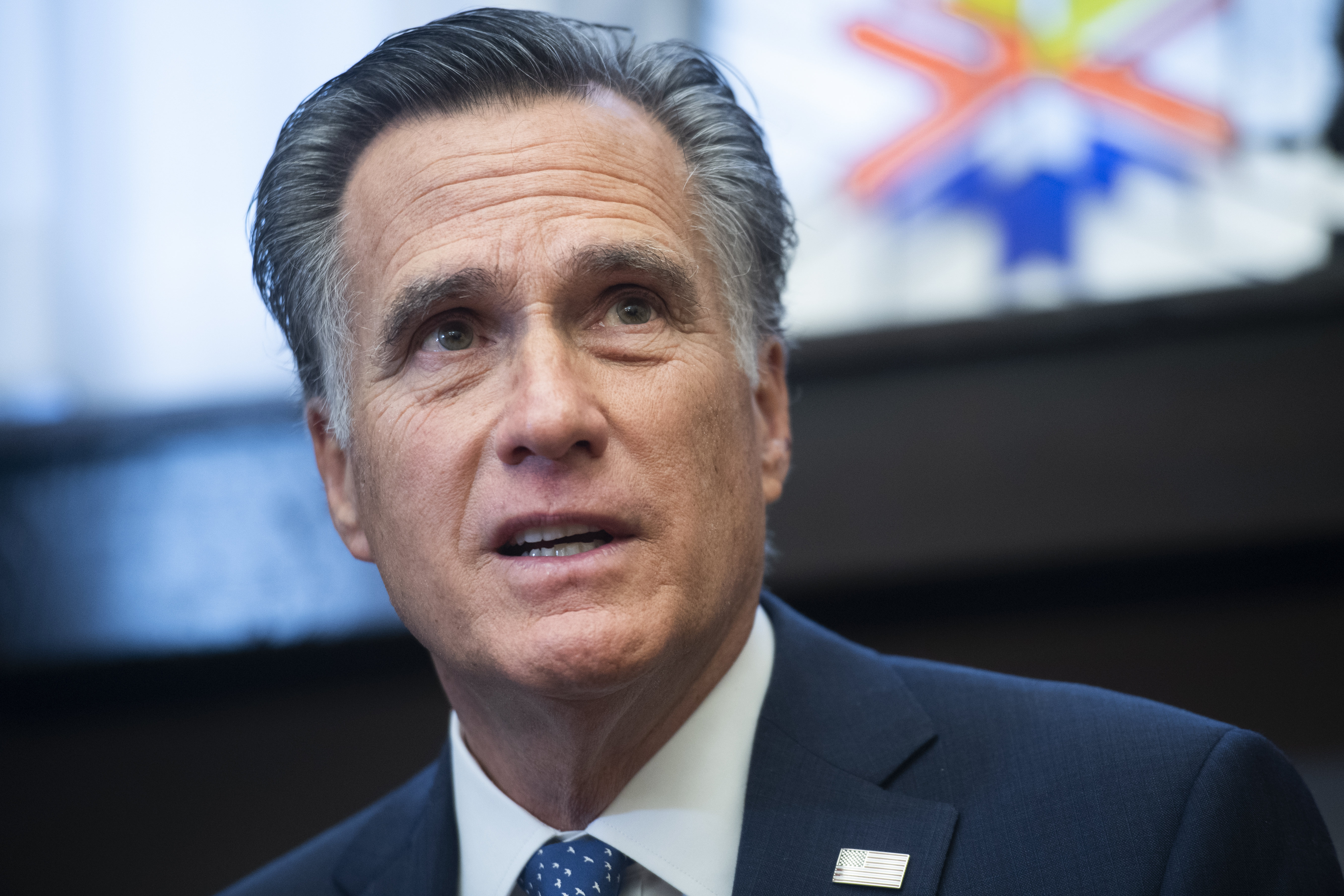 UNITED STATES - DECEMBER 17: Sen. Mitt Romney, R-Utah, conducts a news conference in Russell Building on student athlete compensation on Tuesday, December 17, 2019. NCAA president Mark Emmert and Sen. Chris Murphy, D-Conn., also attended. (Photo By Tom Williams/CQ Roll Call)