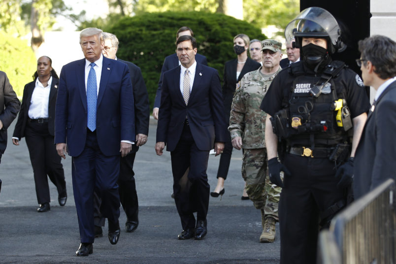 President Donald Trump departs the White House to visit outside St. John's Church, Monday, June 1, 2020, in Washington. Part of the church was set on fire during protests on Sunday night. (AP Photo/Patrick Semansky)