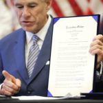 During a press conference at the Texas State Capitol in Austin, Texas Governor Greg Abbott holds a new executive order stating travel by road from any location in the state of Louisiana into Texas will require 14-day self quarantine, Sunday, March 29, 2020.  He also announced the US Army Corps of Engineers and the state are putting up a 250-bed field hospital at the Kay Bailey Hutchison Convention Center in downtown Dallas The space can expand to nearly 1,400 beds. (Tom Fox/The Dallas Morning News/Pool)