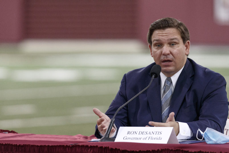 TALLAHASSEE, FL - AUGUST 11: Florida Governor Ron DeSantis speaks during a collegiate athletics roundtable about fall sports at the Albert J. Dunlap Athletic Training Facility on the campus of Florida State University on August 11, 2020 in Tallahassee, Florida. (Photo by Don Juan Moore/Getty Images) *** Local Caption *** Ron DeSantis
