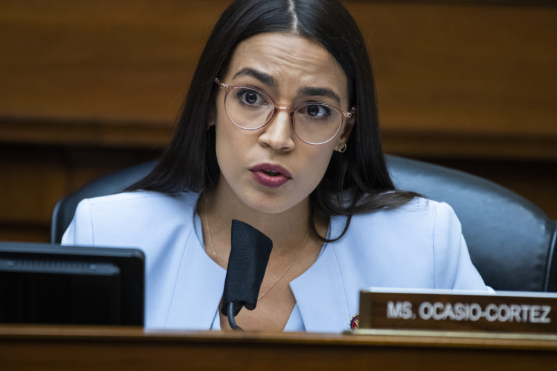 UNITED STATES - AUGUST 24: Rep. Alexandria Ocasio-Cortez, D-N.Y., questions Postmaster General Louis DeJoy during the House Oversight and Reform Committee hearing titled “Protecting the Timely Delivery of Mail, Medicine, and Mail-in Ballots,” in Rayburn House Office Building on Monday, August 24, 2020. (Photo By Tom Williams/CQ Roll Call/Pool)