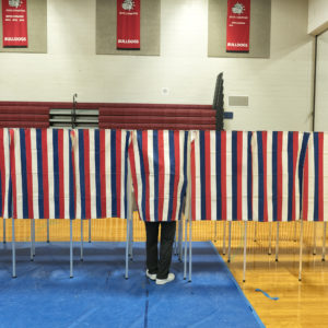 BEDFORD, NH - FEBRUARY 9: Voters head to the polling booths inside the Bedford High school, February 9, 2016 in Bedford, New Hampshire. (Photos by Charles Ommanney/The Washington Post)