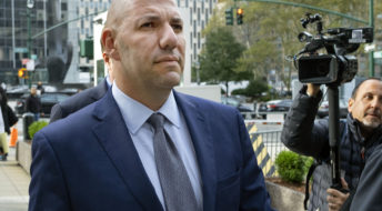FILE- In this Oct. 17, 2019 file photo, David Correia walks from federal court in New York.  (AP Photo/Craig Ruttle, FIle)
