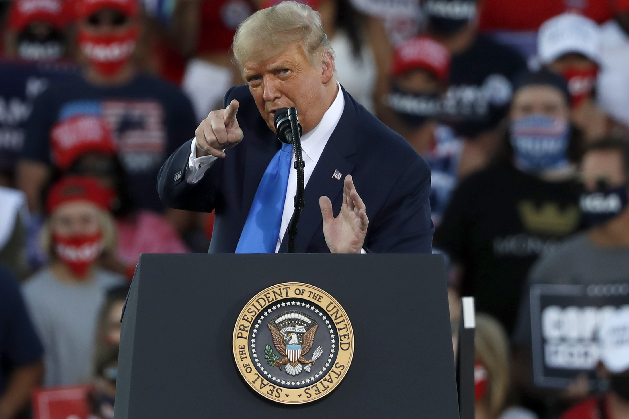 CARSON CITY, NV - OCTOBER 18: President Donald Trump gestures during a campaign rally on October 18, 2020 in Carson City, Nevada. With 16 days to go before the November election, President Trump is back on the campaign trail with multiple daily events as he continues to campaign against Democratic presidential nominee Joe Biden. (Photo by Stephen Lam/Getty Images)