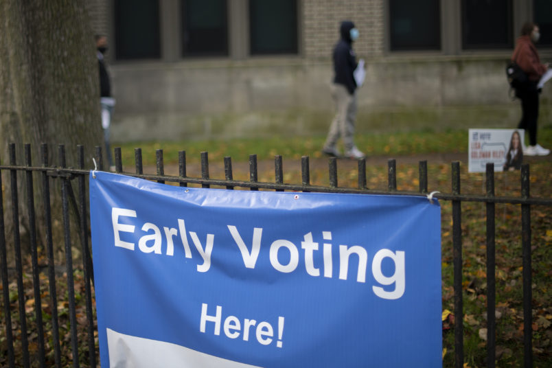 PHILADELPHIA, PA - OCTOBER 27:  Vvoters queue outside of a satellite polling station on October 27, 2020 in Philadelphia, Pennsylvania.  With the election only a week away, this new form of in-person voting by using mail ballots, has enabled tens of millions of voters to cast their ballots before the general election. Vying to recapture the Keystone State’s vital 20 electoral votes in order to bolster his reelection prospects, President Donald Trump held three rallies throughout Pennsylvania yesterday.  (Photo by Mark Makela/Getty Images)