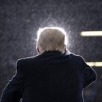 President Donald Trump speaks during a campaign rally at Capital Region International Airport, Tuesday, Oct. 27, 2020, in Lansing, Mich. (AP Photo/Evan Vucci)