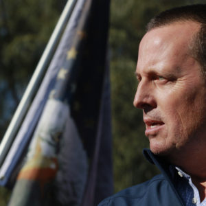 Former Director of National Intelligence Ric Grenell speaks to the news media during a press conference by members of Donald J. Trump for President, Inc., outside Clark County Election Department on November 5, 2020, in North Las Vegas. (Photo by Ronda Churchill / AFP)