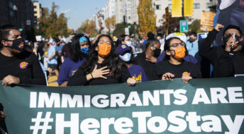 UNITED STATES - NOVEMBER 7: Revelers celebrate Joe Biden becoming the 46th president of the United States on Black Lives Matter Plaza on 16th Street, NW, after news outlets declared victory for Biden and his running mate Sen. Kamala Harris, D-Calif., on Saturday, November 7, 2020. (Photo By Tom Williams/CQ Roll Call)