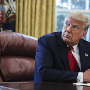President Donald Trump listens during an event commemorating the repatriation of Native American remains and artifacts from the Republic of Finland in the Oval Office of the White House on Thursday, Sept. 17, 2020, Washington, DC.(Photo by Oliver Contreras/For The New York Times)