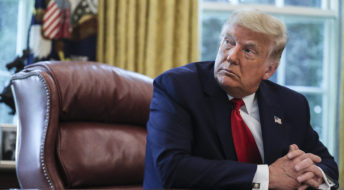 President Donald Trump listens during an event commemorating the repatriation of Native American remains and artifacts from the Republic of Finland in the Oval Office of the White House on Thursday, Sept. 17, 2020, Washington, DC.(Photo by Oliver Contreras/For The New York Times)