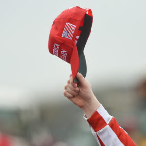 A supporter of President Donald J. Trump hold up their Make America Great Again hat. At the Reading Regional Airport in Bern Township, PA Saturday afternoon October 31, 2020 where United States President Donald J. Trump spoke during a campaign rally for his bid for reelection.