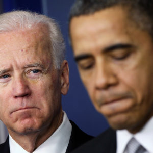WASHINGTON, DC - DECEMBER 19:  U.S. President Barack Obama (R) speaks as Vice President Joseph Biden (L) listens during an announcement on gun reform in the Brady Press Briefing Room of the White House December 19, 2012 in Washington, DC. President Obama announced that he is making an administration-wide effort to solve gun violence and has tapped Vice President Biden to lead the effort in the wake of the Sandy Hook Elementary School shooting in Newtown, Connecticut.  (Photo by Alex Wong/Getty Images)