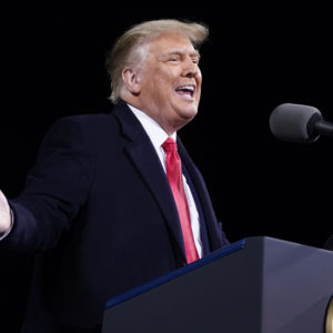 President Donald Trump speaks at a campaign rally for Senate Republican candidates, Sen. Kelly Loeffler, R-Ga., and Sen. David Perdue, R-Ga., at Valdosta Regional Airport, Saturday, Dec. 5, 2020, in Valdosta, Ga. (AP Photo/Evan Vucci)