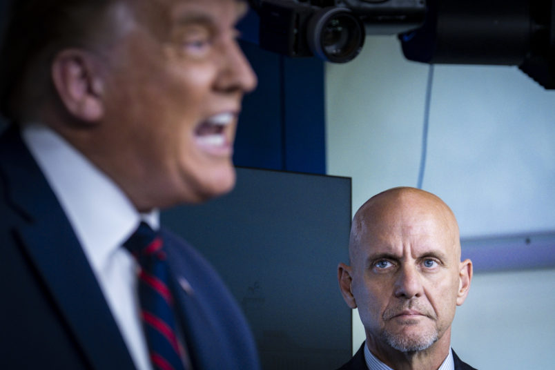 WASHINGTON, DC - AUGUST 23: FDA Commissioner Stephen Hahn looks on as President Donald Trump announces that the Food and Drug Administration is issuing an emergency authorization for blood plasma as a coronavirus treatment during a press conference in James S. Brady Briefing Room at the White House on on August 23, 2020 in Washington, DC. The move by the FDA comes after President Trump accused the FDA of slow-walking the therapy to harm his reelection chances.(Photo by Pete Marovich/Getty Images)