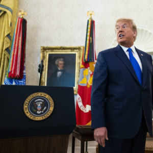 President Donald Trump presents the Presidential Medal of Freedom to Dan Gable in the Oval Office, Monday, Dec, 7, 2020.   ( Photo by Doug Mills/The New York Times)