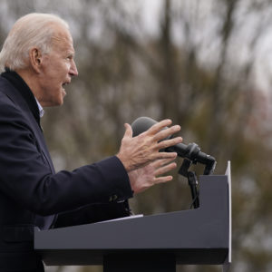 President-elect Joe Biden speaks at a drive-in rally for Georgia Democratic candidates for U.S. Senate Raphael Warnock and Jon Ossoff, Tuesday, Dec. 15, 2020, in Atlanta. (AP Photo/Patrick Semansky)