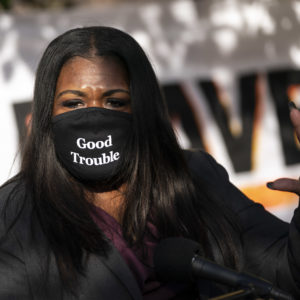 WASHINGTON, DC - NOVEMBER 19: Congresswoman-elect Rep. Cori Bush (D-MO) speaks outside of the Democratic National Committee headquarters on November 19, 2020 in Washington, DC. Bush, Alexandria Ocasio-Cortez and others called on the incoming Joe Biden administration to take bold action on issues of climate change and economic inequalities. (Photo by Drew Angerer/Getty Images)