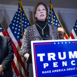 UNITED STATES - NOVEMBER 19: Sidney Powell, attorney for President Donald Trump, conducts a news conference at the Republican National Committee on lawsuits regarding the outcome of the 2020 presidential election on Thursday, November 19, 2020. Trump attorney Rudolph Giuliani, left, also attended. (Photo By Tom Williams/CQ Roll Call)