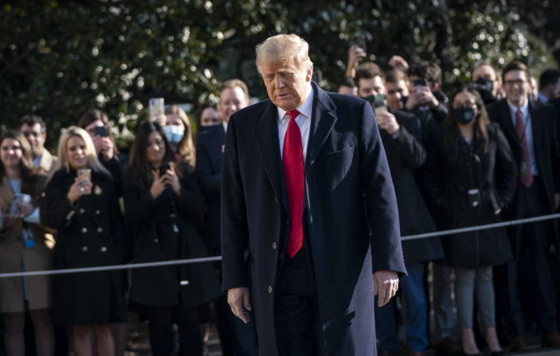 WASHINGTON, DC - JANUARY 12: U.S. President Donald Trump walks toward reporters as he exits the White House to walk toward Marine One on the South Lawn on January 12, 2021 in Washington, DC. Following last week's deadly pro-Trump riot on Capitol Hill, President Trump is making his first public appearance on Tuesday as he makes a trip to the border town of Alamo, Texas to view the partial construction of a wall along the U.S.-Mexico border. (Photo by Drew Angerer/Getty Images)