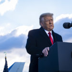 President Donald Trump speaks to supporters at Joint Base Andrews before boarding Air Force One for his last time as President on January 20, 2021. Trump is traveling to his Mar-a-Lago Club in Palm Beach, Fla. (photo by Pete Marovich for The New York Times)NYTINAUG