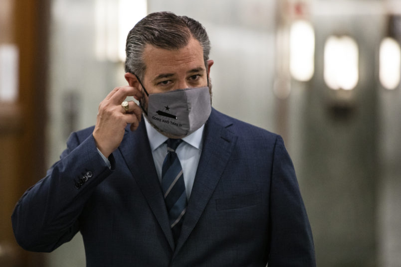 WASHINGTON, DC - OCTOBER 22: Senator Ted Cruz (R-TX) heads into a Judiciary Committee hearing where Republicans will vote on whether or not to move the nomination of Judge Amy Coney Barrett to the Supreme Court out of committee and on to the Senate for a full vote on October 22, 2020 in Washington, DC. Judge Amy Coney Barrett was nominated by President Donald Trump to fill the vacancy left by Justice Ruth Bader Ginsburg who passed away in September. (Photo by Samuel Corum/Getty Images) *** Local Caption *** Ted Cruz