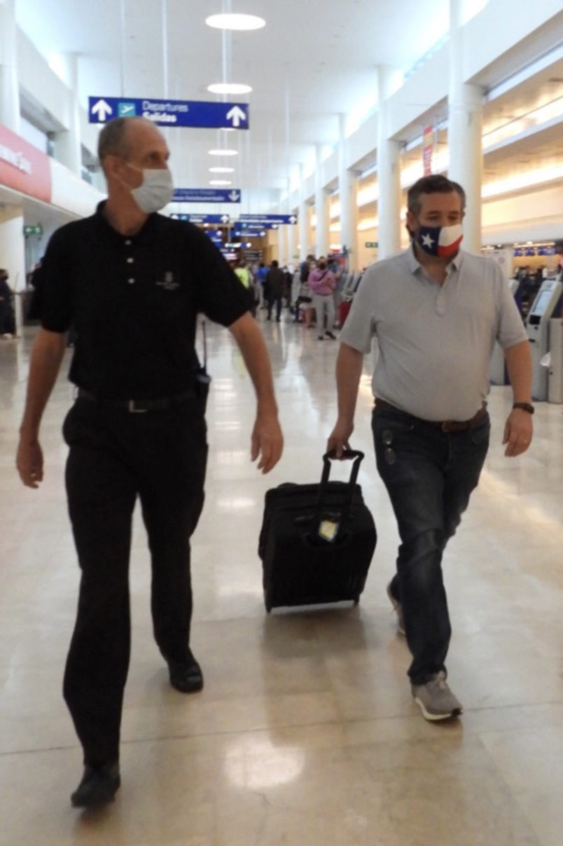 CANCUN, QUINTANA ROO - FEBRUARY 18: Ted Cruz checks in for a flight at Cancun International Airport after a backlash over his Mexican family vacation as his home state of Texas endured a Winter storm. The Republican politician came under fire after jetting to the warm holiday destination as hundreds of thousands of people in the lone star state suffered a loss of power. Reports stated that Cruz was due to catch a flight back to Houston, Texas on February 18, 2021 in Cancun, Quintana Roo. (Photo by MEGA/GC Images)
