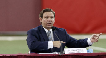 TALLAHASSEE, FL - AUGUST 11: Florida Governor Ron DeSantis speaks during a collegiate athletics roundtable about fall sports at the Albert J. Dunlap Athletic Training Facility on the campus of Florida State University on August 11, 2020 in Tallahassee, Florida. (Photo by Don Juan Moore/Getty Images) *** Local Caption *** Ron DeSantis