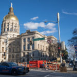 ATLANTA, GA - JANUARY 17: Rifle carrying supporters of the second amendment stand outside of the Georgia Capitol building on January 17, 2021 in Atlanta, United States. Supporters of President Trump gathered at state capitol buildings throughout the nation today to protest the presidential election results and the upcoming inauguration of President-elect Joe Biden.  (Photo by Megan Varner/Getty Images)