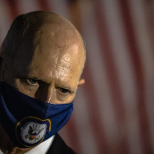 WASHINGTON, DC - OCTOBER 26: Senator Rick Scott (R-FL) talks to reporters as he leaves the Republicans Policy Luncheon on October 26, 2020 in Washington, DC. It is expected that the Senate will vote on the nomination of Judge Amy Coney Barrett to be an Associate Justice of the Supreme Court later in the day. (Photo by Samuel Corum/Getty Images) *** Local Caption *** Rick Scott