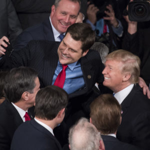 UNITED STATES - JANUARY 30: President Donald Trump takes a selfie with Rep. Matt Gaetz, R-Fla., in the House chamber after Trump's State of the Union address to a joint session of Congress on January 30, 2018. (Photo By Tom Williams/CQ Roll Call)