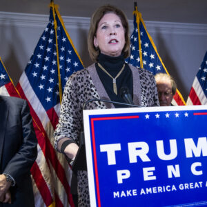 UNITED STATES - NOVEMBER 19: Sidney Powell, attorney for President Donald Trump, conducts a news conference at the Republican National Committee on lawsuits regarding the outcome of the 2020 presidential election on Thursday, November 19, 2020. Trump attorney Rudolph Giuliani, left, also attended. (Photo By Tom Williams/CQ Roll Call)