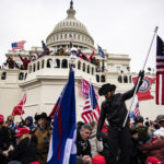 WASHINGTON, DC - JANUARY 06: Pro-Trump supporters storm the US Capitol following a rally with President Donald Trump on January 6, 2021 in Washington, DC. Trump supporters gathered in the nation's capital today to protest the ratification of President-elect Joe Biden's Electoral College victory over President Trump in the 2020 election. (Photo by Samuel Corum/Getty Images)