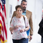 UNITED STATES - MAY 27: Gladys Sicknick, center, the mother of late Capitol Police Officer Brian Sicknick, D.C. Metropolitan Police Department Officer Michael Fanone,  and Sandra Garza, the companion of the late officer arrive to a meeting with Sen. Ron Johnson, R-Wis., to urge Republican senators to support a bipartisan commission to investigate the January 6th attack on the Capitol, in Hart Building on Thursday, May 27, 2021. Sicknick died of two strokes after a day after defending the Capitol from rioters. (Photo By Tom Williams/CQ Roll Call)