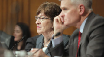 WASHINGTON, D.C. - DECEMBER 12: Sen. Susan Collins listens to testimony during a hearing about the cost of prescription drugs to the Health, Education, Labor and Pensions committee on Capitol Hill in Washington, D.C. on Tuesday, December 12, 2017. In the foreground is Sen. Bill Cassidy (R-LA). (Staff Photo by Gregory Rec/Staff Photographer)