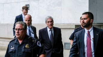 WASHINGTON, DC - JULY 24: Former Special Counsel Robert Mueller (center) is seen leaving after testifying to the House Judiciary Committee about his report on Russian interference in the 2016 presidential election on Capitol Hill on July 24, 2019 in Washington, DC. Mueller dismissed President Trump's claims of total exoneration before the House Judiciary Committee earlier in the day on Wednesday. (Photo by Alex Wroblewski/Getty Images)