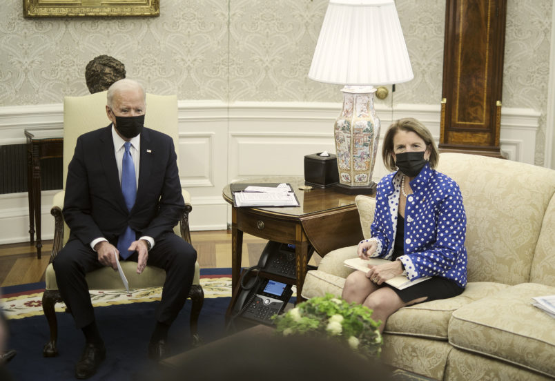 WASHINGTON, DC - MAY 13, 2021: President Joe Biden makes a brief statement to the press during a meeting with a group of republican senators, including Sen. Shelley Capito (R-WV), right, to discuss the administration’s infrastructure plan, in the Oval Office at the White House in Washington, D.C., on May 13, 2021. CREDIT: T.J. Kirkpatrick for The New York Times