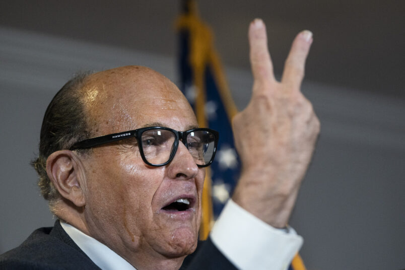 WASHINGTON, DC - NOVEMBER 19: Rudy Giuliani accuses people of voting twice as he speaks to the press about various lawsuits related to the 2020 election, inside the Republican National Committee headquarters on November 19, 2020 in Washington, DC. President Donald Trump, who has not been seen publicly in several days, continues to push baseless claims about election fraud and dispute the results of the 2020 United States presidential election. (Photo by Drew Angerer/Getty Images)