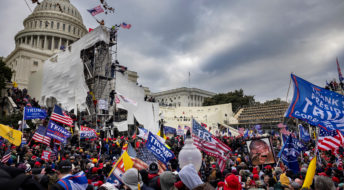 WASHINGTON D.C., USA - JANUARY 6: Trump supporters clash with police and security forces as people try to storm the US Capitol in Washington D.C on January 6, 2021. Demonstrators breeched security and entered the Capitol as Congress debated the 2020 presidential election Electoral Vote Certification. (photo by Brent Stirton/Getty Images)