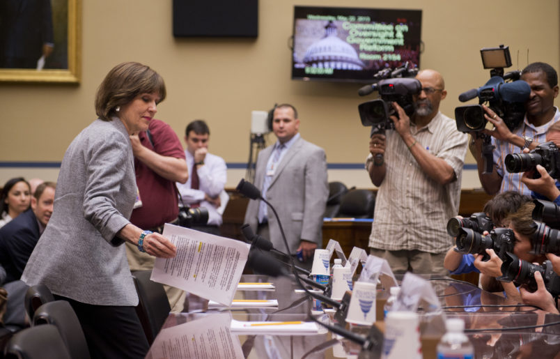 UNITED STATES - MAY 22: Lois Lerner, director of exempt organizations for the Internal Revenue Service, arrives for a House Oversight and Government Reform Committee hearing on the investigation of the IRS's targeting of political groups. Lerner invoked her Fifth Amendment right to not testify. Lerner cause a protest from some committee members when she offered an opening statement and engaged in dialogue with members before invoking her right. (Photo By Tom Williams/CQ Roll Call)